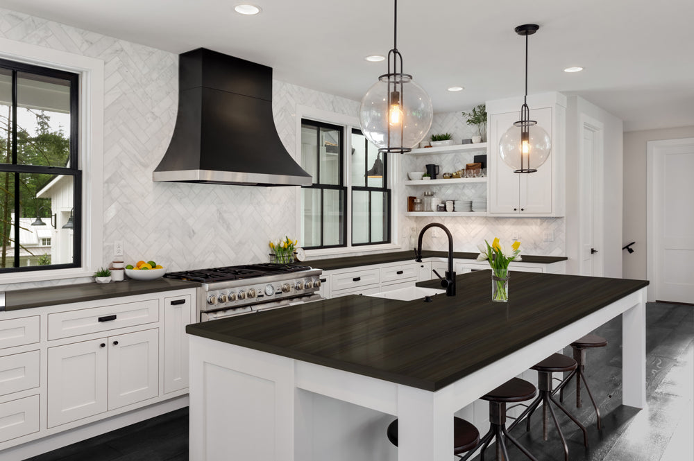 Retique It Liquid Wood Wood'n Stain in 16 oz Classic Black applied on a kitchen countertop, showcasing rich black stain finish.