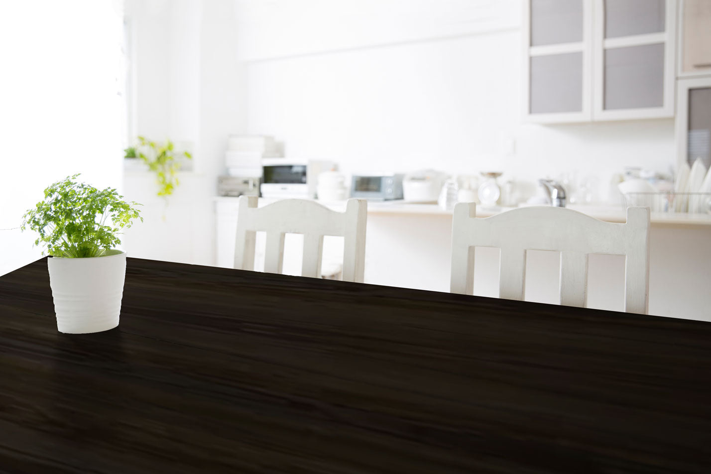 Retique It Liquid Wood Wood'n Stain in Classic Black applied to a wooden tabletop, showcasing smooth, even stain coverage.