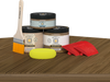 Retique It Wood'n Kit in Barn Wood finish, multi-purpose wood finish kit displayed on a table, ideal for furniture restoration.