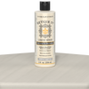 Retique It Liquid Wood Wood'n Primer in bleached wood finish, 8 fl oz, shown on a table surface for wood refinishing projects.