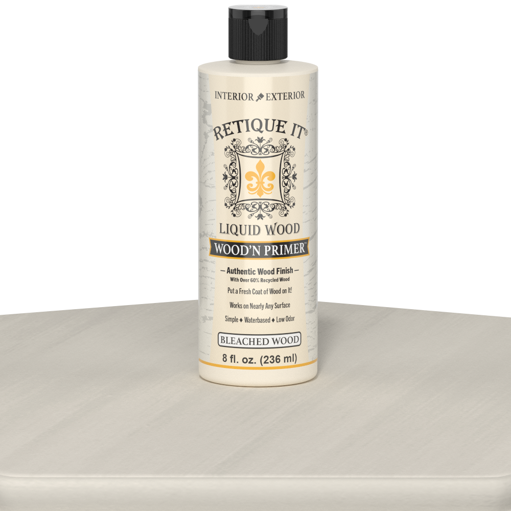 Retique It Liquid Wood Wood'n Primer in bleached wood finish, 8 fl oz, shown on a table surface for wood refinishing projects.