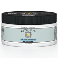 Retique It White Wash gel stain applied to wood surface, showcasing a smooth, whitewashed finish for furniture or decor projects.